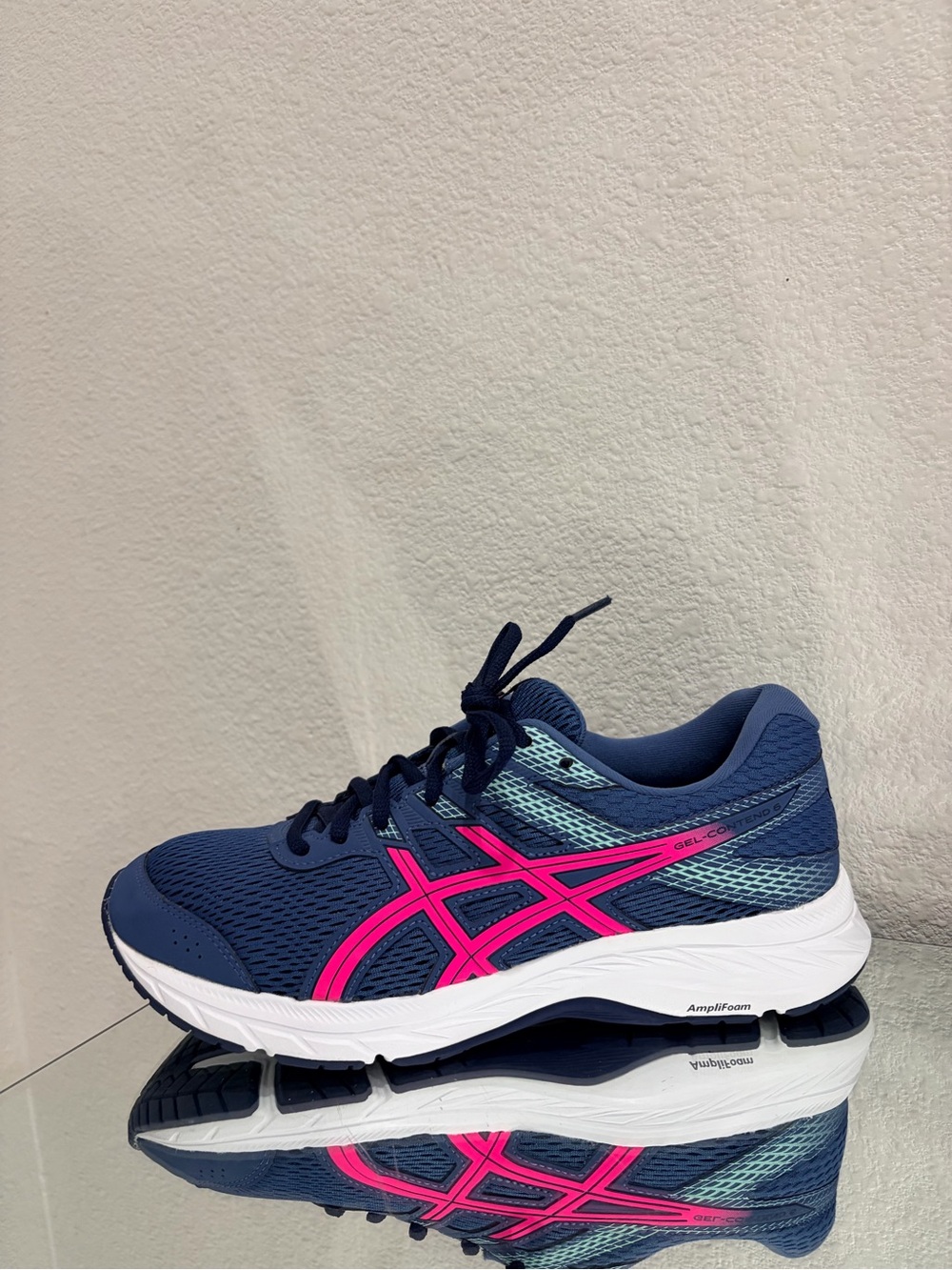 Asics Navy Running Shoe with Pink Logo